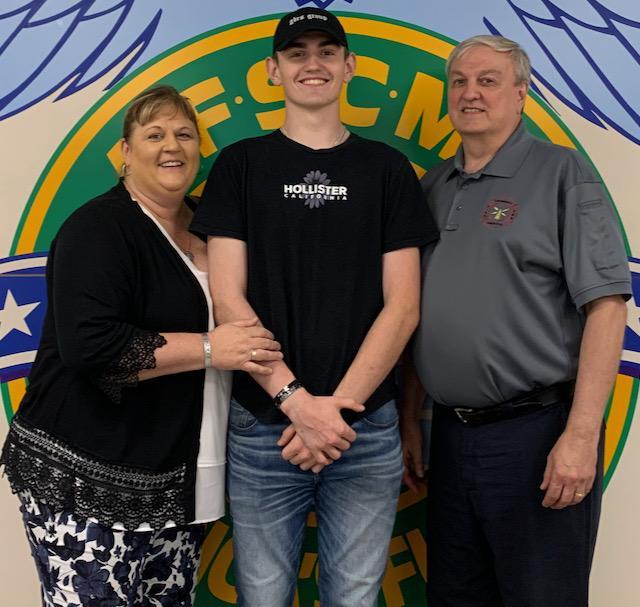 Zachary Jahn with his parents Susan and David (Local 1303-475)